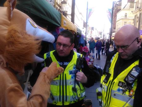 Freddy Fox explaining to some local bobbies why people shouldn't wear fur!